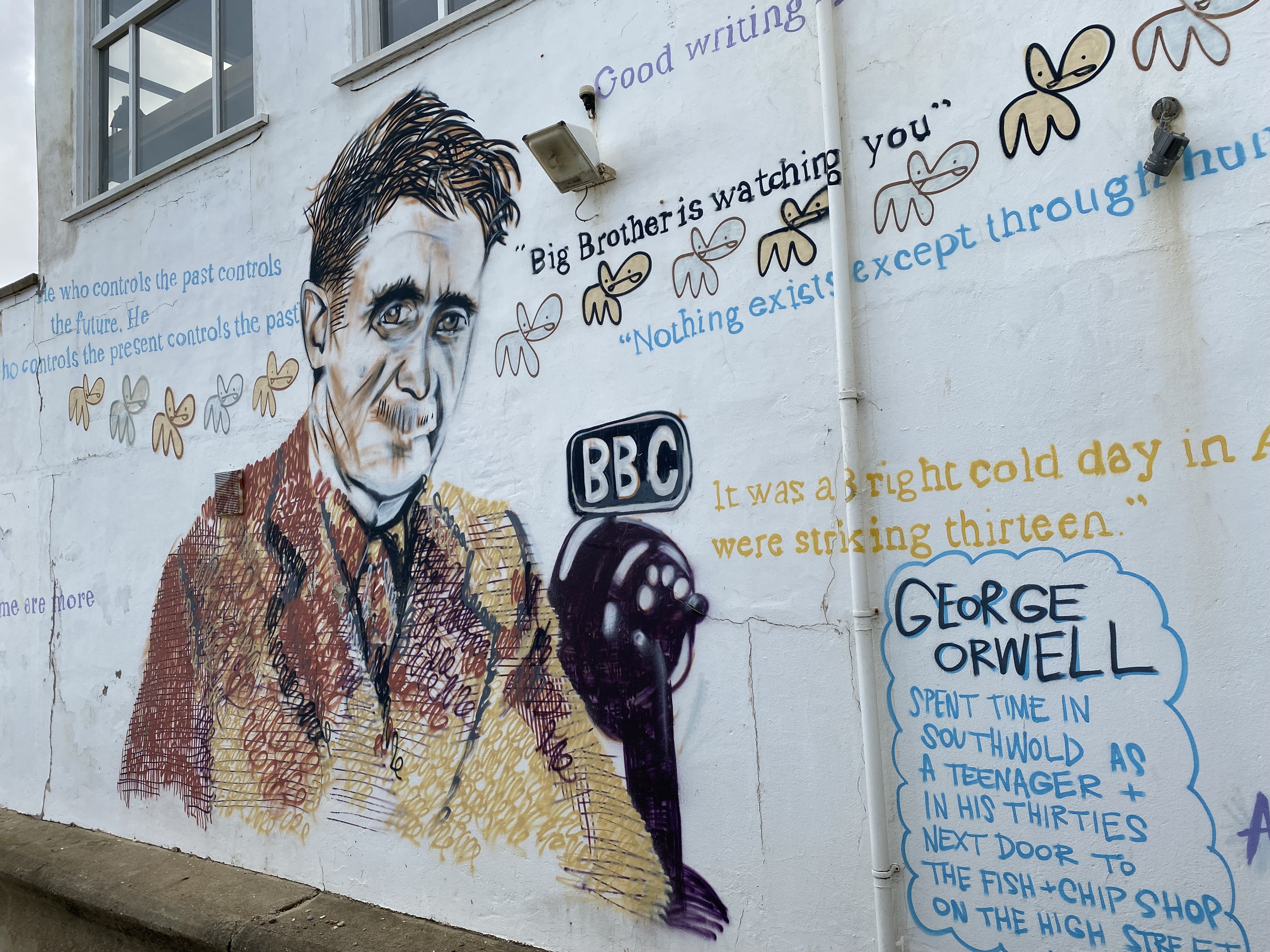 A mural of Orwell on a wall in Southwold